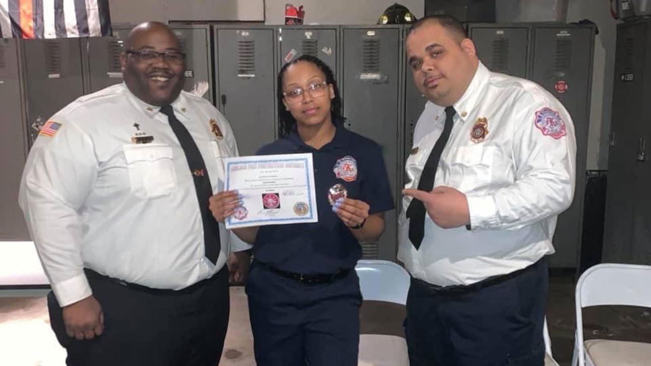 Arlydia Bufford was sworn in as a firefighter in January of 2020. She is pictured here with Fire Chief Kevin Stewart (left) and Assistant Fire Chief Edward Darden (right).