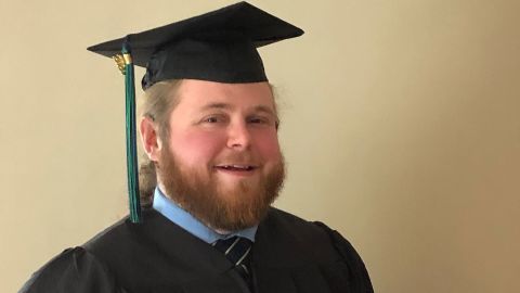 After dropping out of college 10 years ago, Clayton Ward graduated Tuesday with his associate's degree from MassBay Community College in hopes to become a high school history teacher. 