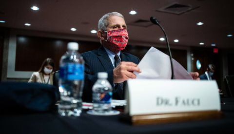 Dr. Anthony Fauci, director of the National Institute of Allergy and Infectious Diseases, wears a Washington Nationals mask June 30 as he arrives <a href="https://www.cnn.com/2020/06/30/politics/fauci-redford-testimony-senate-coronavirus/index.html" target="_blank">to testify at a Senate committee hearing</a> about the coronavirus pandemic. Fauci issued a stark warning to lawmakers, telling them he wouldn't be surprised if the United States sees new cases of coronavirus rising to a level of 100,000 a day.