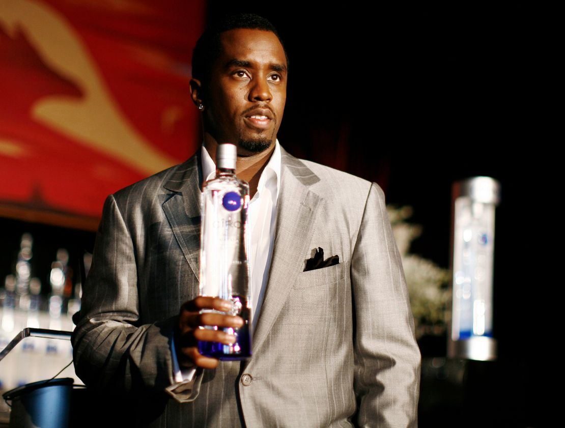 Sean "Diddy" Combs poses with a bottle of Ciroc vodka in 2007.