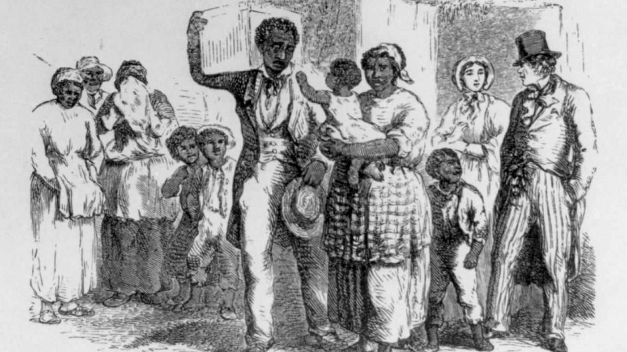 A enslaved Black man sold away from his family. 