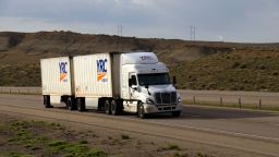 YRC Freightliner Tractor pulls a set of white "pup" trailers. May 7th, 2017 Rock Springs, Wyoming, USA
