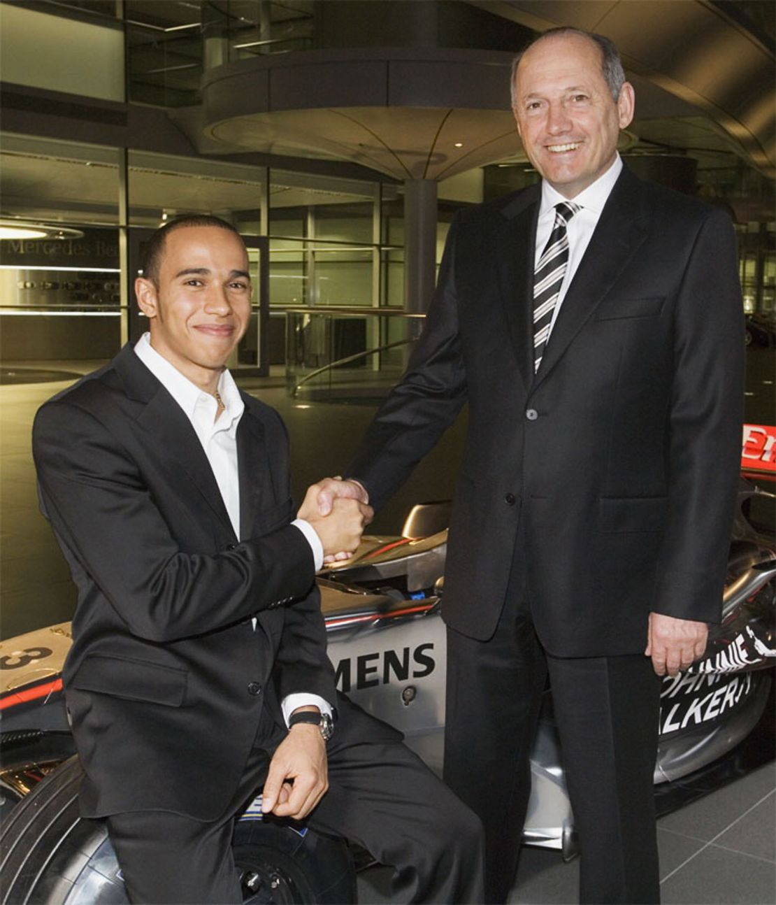 Hamilton joined McLaren's Young Driver Development programme in 1998 and signed for the F1 team in 2007. Here he is pictured with former McLaren boss Ron Dennis. 