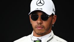 MELBOURNE, AUSTRALIA - MARCH 12: Lewis Hamilton of Great Britain and Mercedes GP poses for a photo in the Paddock during previews ahead of the F1 Grand Prix of Australia at Melbourne Grand Prix Circuit on March 12, 2020 in Melbourne, Australia. (Photo by Charles Coates/Getty Images)