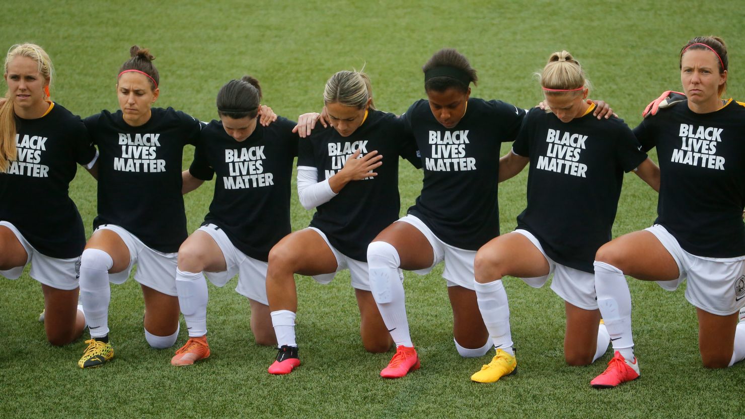 Women's soccer league players and officials kneel during anthem | CNN