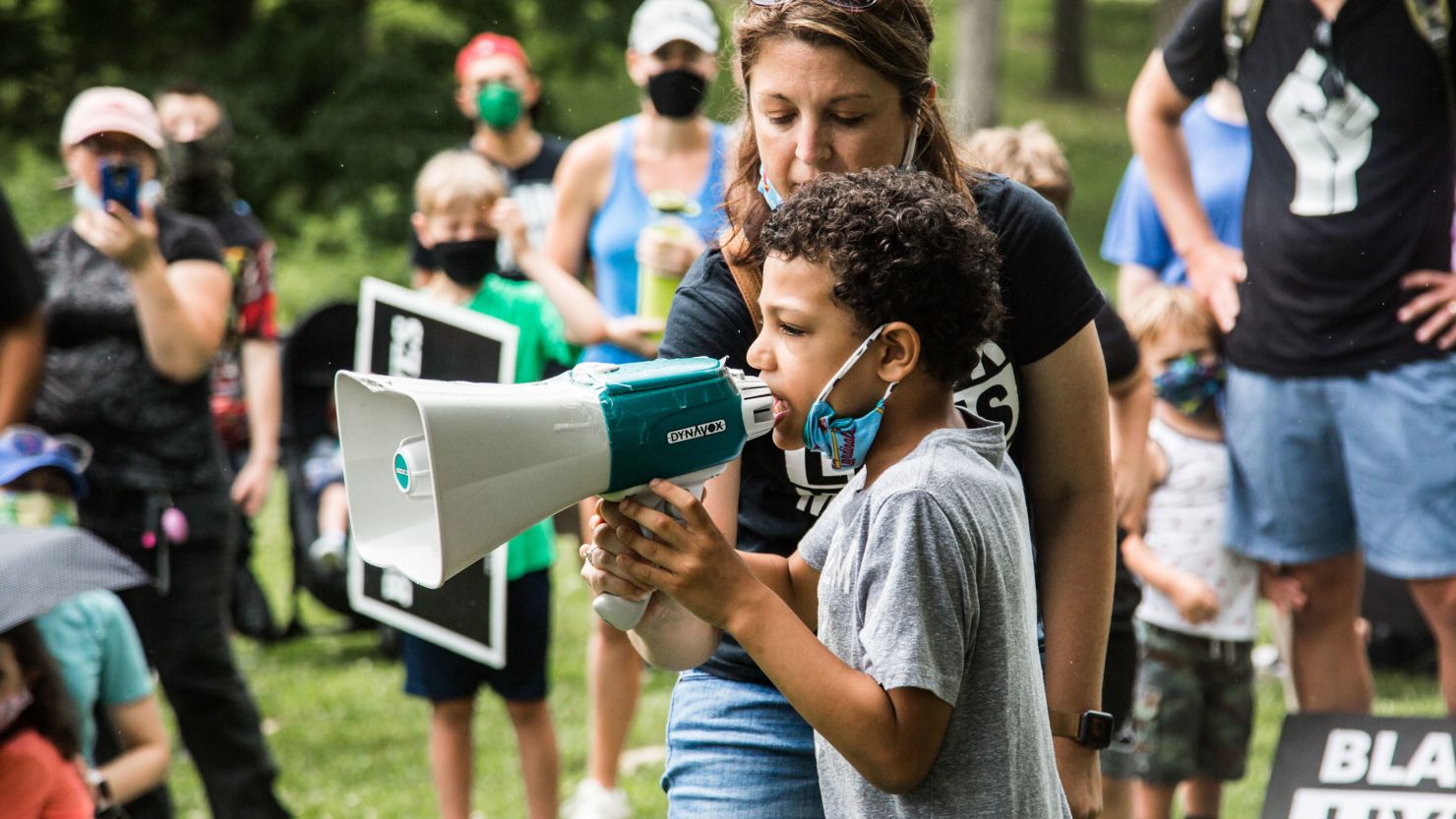 8-year-old Nolan Davis speaking at the Black Lives Matter protest he led Saturday in Kirkwood, Missouri. 