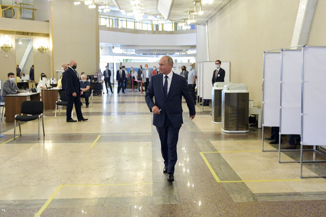 Russian President Vladimir Putin votes at a polling station in Moscow on Wednesday.