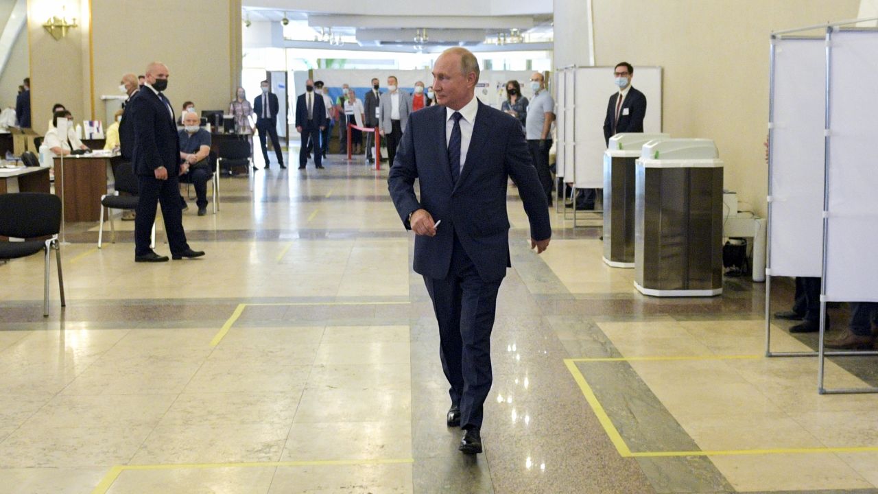 Russian President Vladimir Putin votes at a polling station in Moscow on Wednesday.