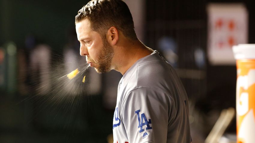 Oct 7, 2019; Washington, DC, USA; Los Angeles Dodgers starting pitcher Rich Hill (44) spits in the dugout during the third inning against the Washington Nationals in game four of the 2019 NLDS playoff baseball series at Nationals Park. Mandatory Credit: Geoff Burke-USA TODAY Sports