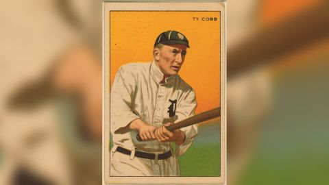 Ty Cobb of the Detroit Tigers on a cigarette baseball card celebrating champions.   
