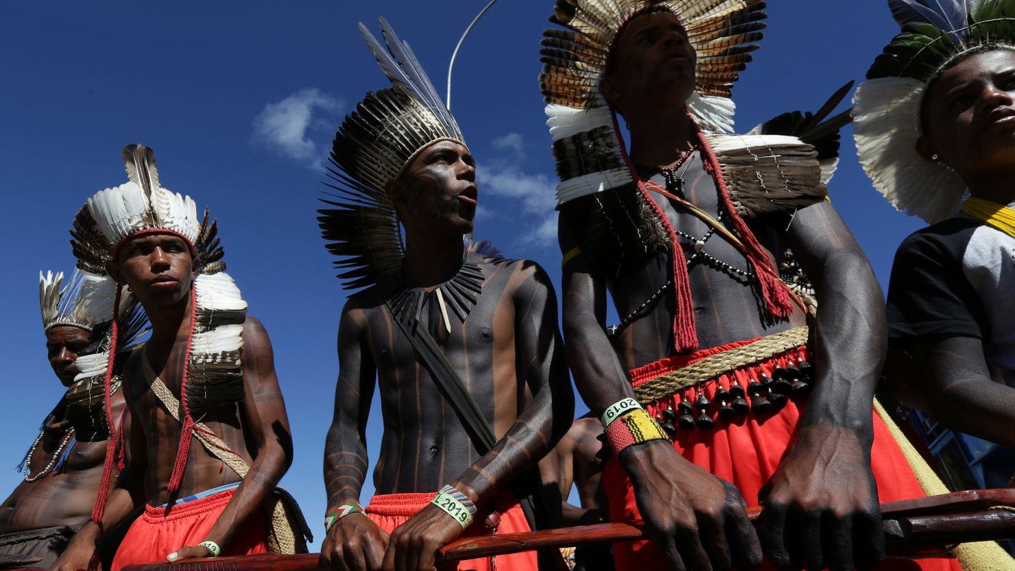 In this photo from April of 2019, Xavante people carry their traditional weapons during the annual three-day protest known as The Free Land Encampment.