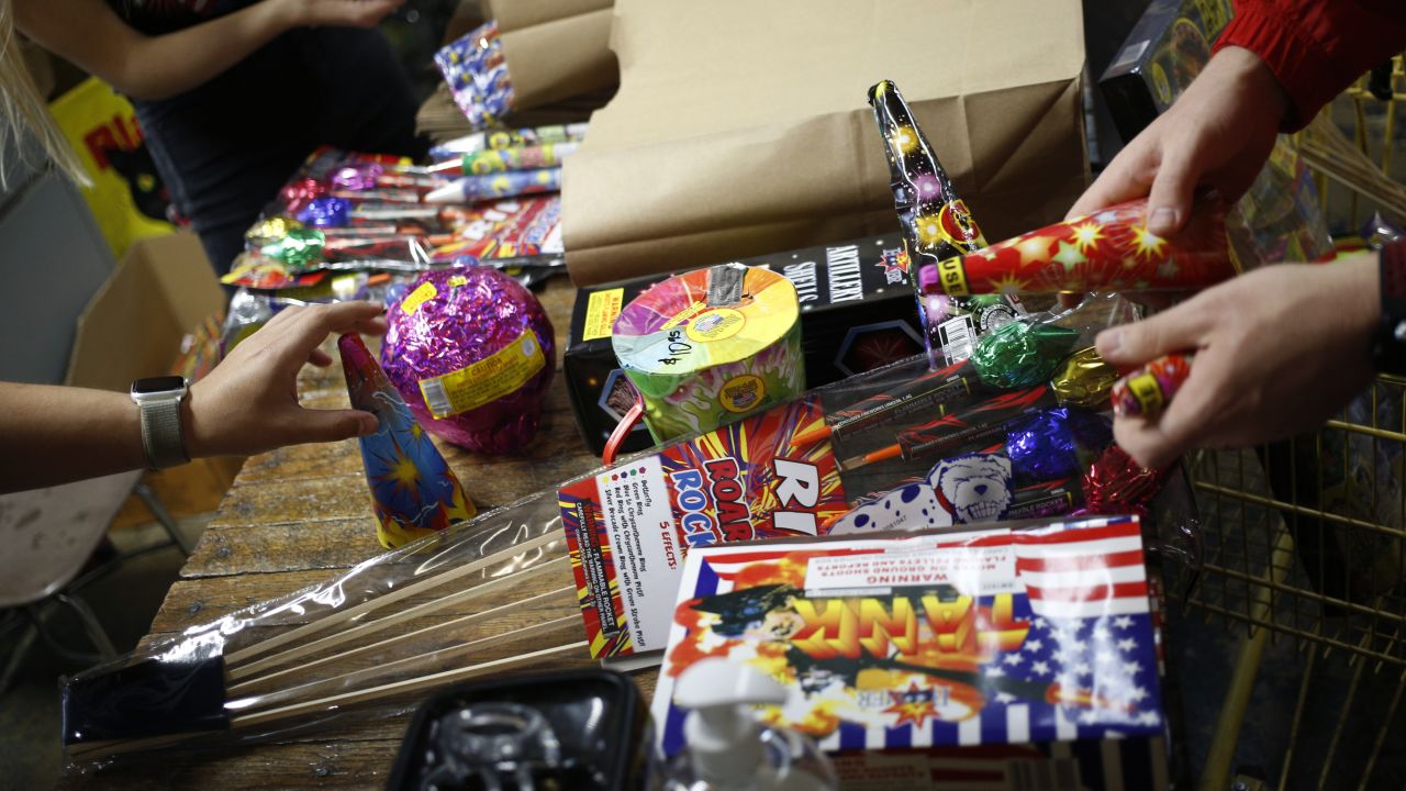 Employees ring up customer purchases at Hee Haw Fireworks in Goodlettsville, Tennessee, on Wednesday, June 30, 2020. 