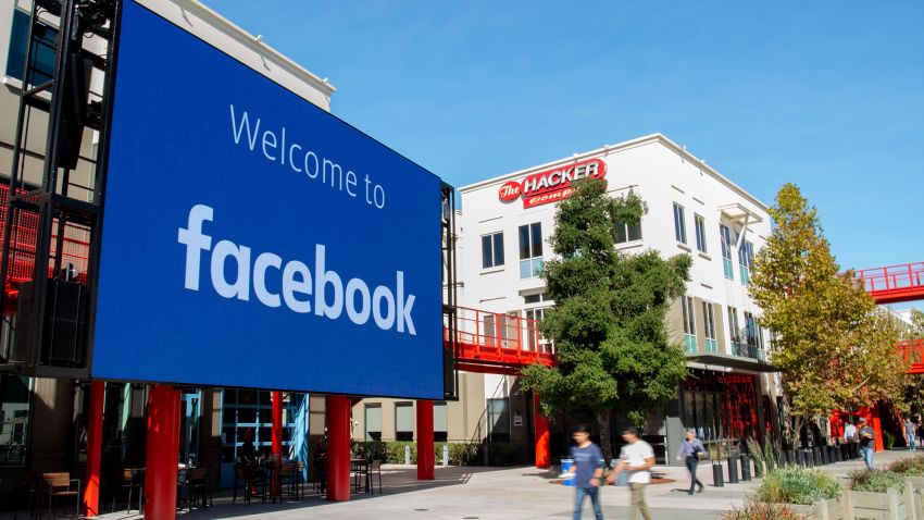 A giant digital sign is seen at Facebook's corporate headquarters campus in Menlo Park, California, on October 23, 2019. (Photo by Josh Edelson/AFP/Getty Images)