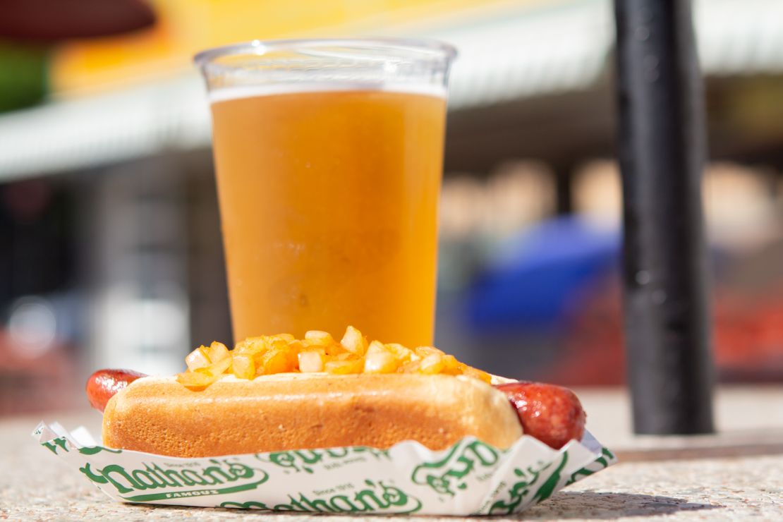 A visit to Coney Island in the summer nearly always involves hot dogs, and, frequently, beer.