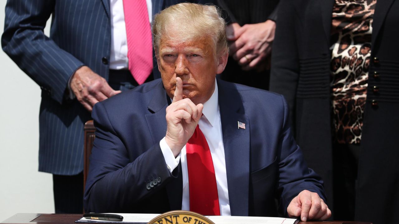 WASHINGTON, DC - JUNE 05: U.S. President Donald Trump shushes journalists before signing the Paycheck Protection Program Flexibility Act in the Rose Garden at the White House June 05, 2020 in Washington, DC. In the midst of nationwide protests against the death of George Floyd, the U.S. Labor Department announced the unemployment rate fell to 13.3 percent in May, a surprising improvement in the nation's job market as hiring rebounded faster than economists expected in the wake of the novel coronavirus pandemic. (Photo by Chip Somodevilla/Getty Images)