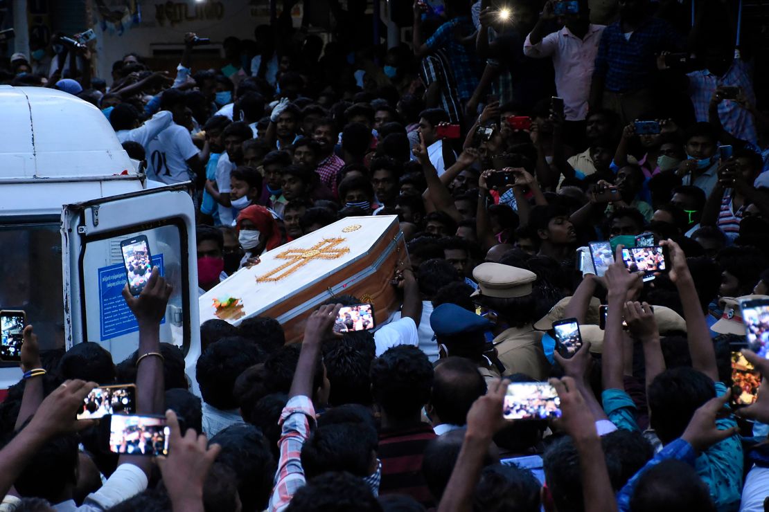 Residents gather as they carry the coffin of Jayaraj and son Bennicks Immanuel, who were allegedly tortured at the hands of police in the Indian state of Tamil Nadu. 