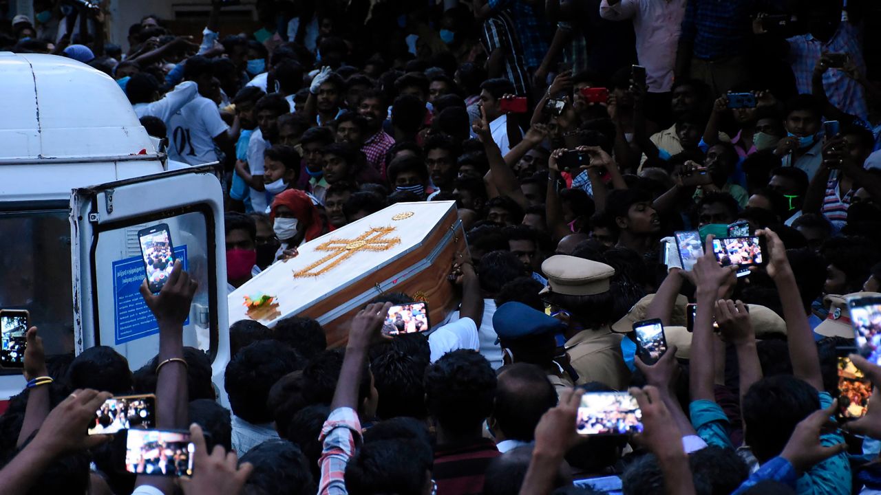 Residents gather as they carry the coffin of Jayaraj and son Bennicks Immanuel, who were allegedly tortured at the hands of police in the Indian state of Tamil Nadu. 