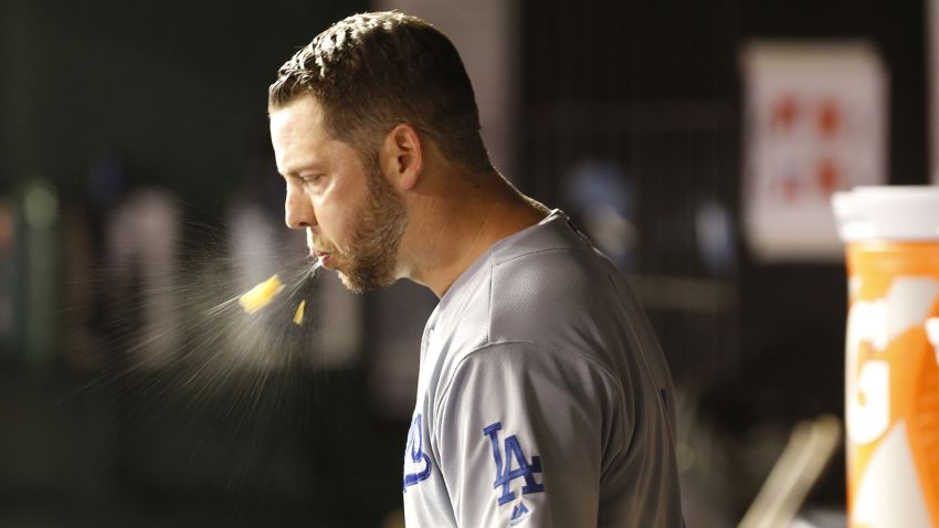 Oct 7, 2019; Washington, DC, USA; Los Angeles Dodgers starting pitcher Rich Hill (44) spits in the dugout during the third inning against the Washington Nationals in game four of the 2019 NLDS playoff baseball series at Nationals Park. Mandatory Credit: Geoff Burke-USA TODAY Sports
