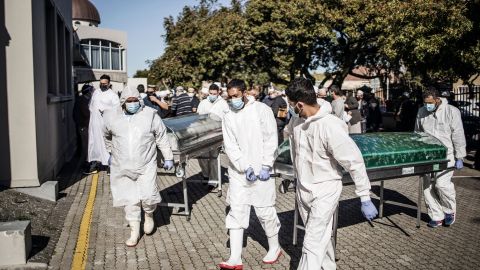 Undertakers carry coffins after funerals for Covid-19 victims at a Cape Town mosque in June. The Western Cape province is now in the middle of the peak of its coronavirus surge.