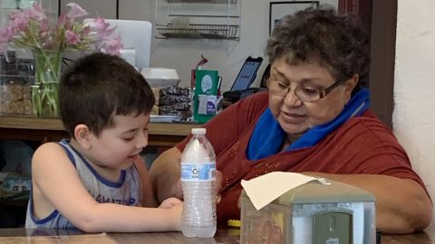 My nephew, Jackson, a third generation patron, gets in a meal and play time with Shelly Villarreal, whose family owns The Red Barn BBQ. The family-owned restaurant, closed because of coronavirus, had a special connection with their customers.