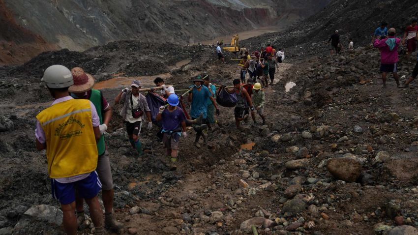 Rescuers recover bodies near the landslide area in the jade mining site in Hpakhant in Kachin state on July 2, 2020. - The battered bodies of more than 120 jade miners were pulled from a sea of mud after a landslide in northern Myanmar on July 2 after one of the worst-ever accidents to hit the treacherous industry. (Photo by Zaw Moe Htet / AFP) (Photo by ZAW MOE HTET/AFP via Getty Images)