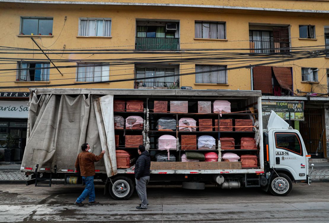 Coffins are brought to a funeral store in Santiago, Chile, on June 19, during the new coronavirus pandemic.
