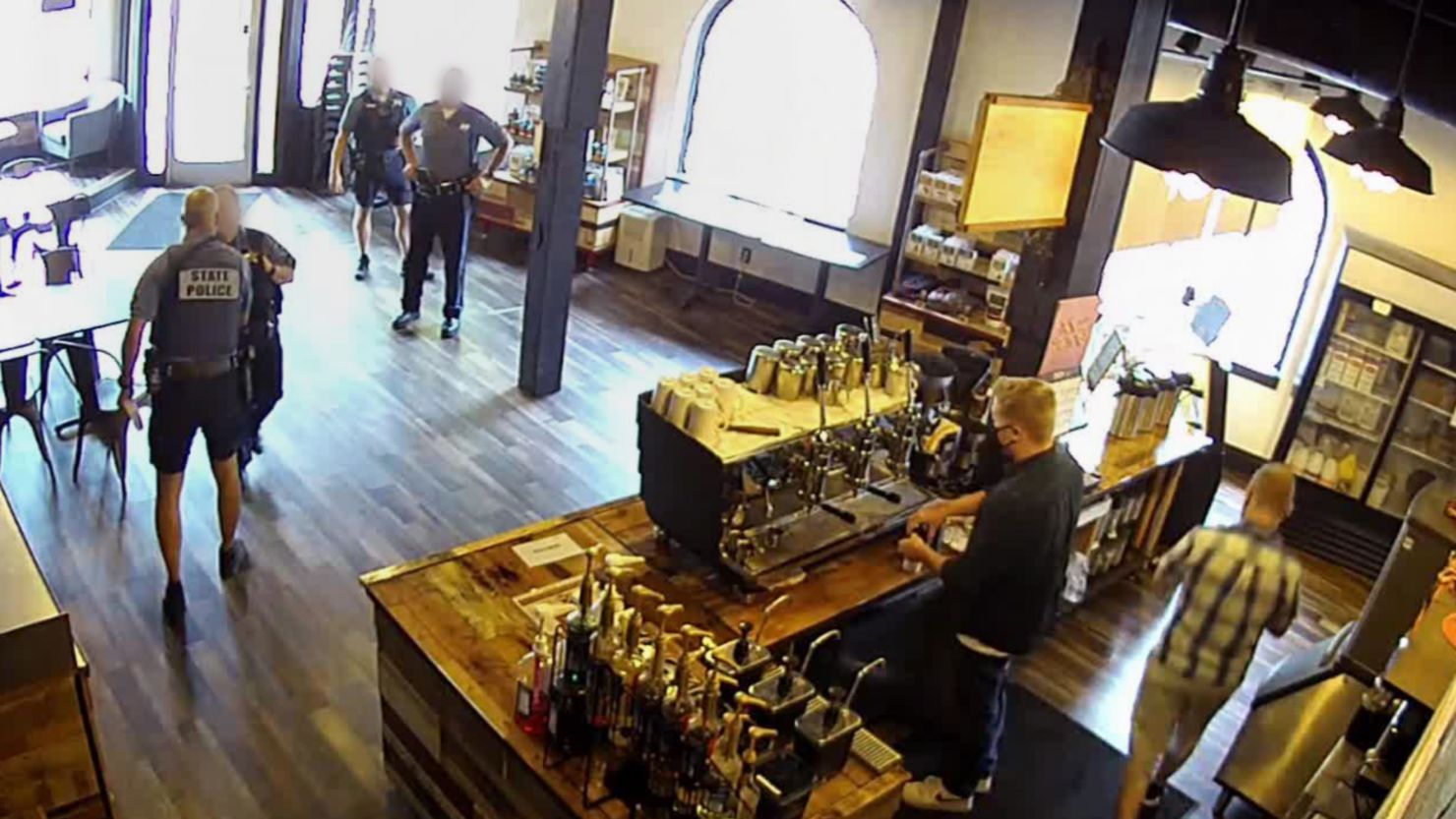 An Oregon State Trooper is on administrative leave after four troopers defy state's mask mandate in coffee shop.
