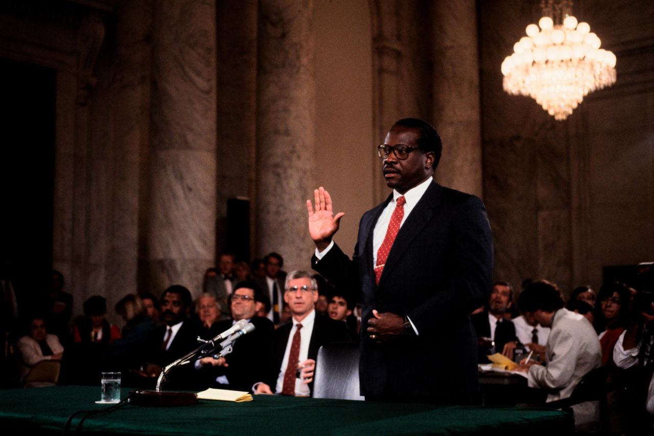 Thomas is sworn in for his Senate confirmation hearings, which turned out to be contentious. Two days before the scheduled Senate vote, it was reported that law professor Anita Hill had made allegations of sexual harassment against Thomas. The vote was then delayed for a week after Thomas asked for time to clear his name and bolster support for his nomination.