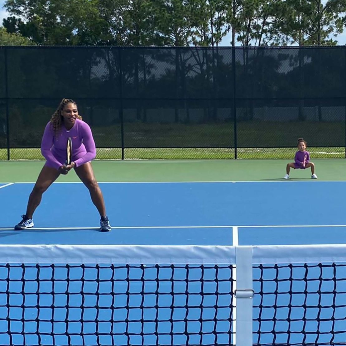 Serena Williams played tennis alongside daughter Olympia. 