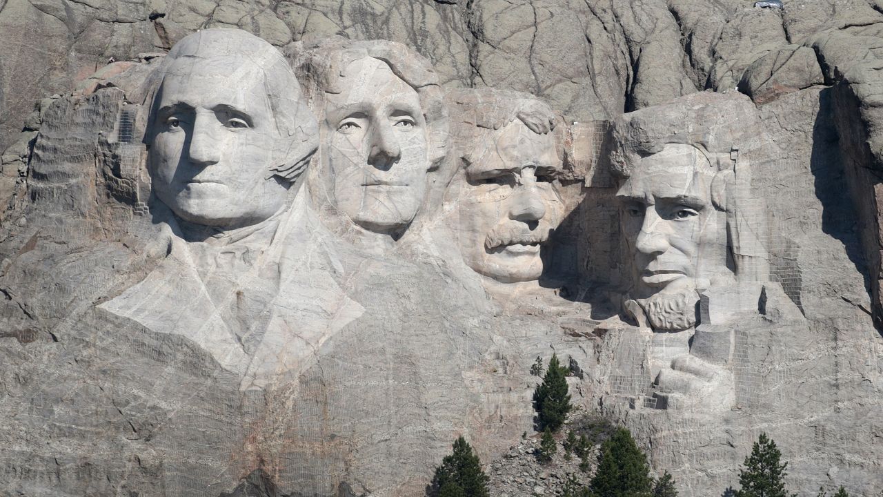 The busts of Presidents George Washington, Thomas Jefferson, Theodore Roosevelt and Abraham Lincoln tower over the Black Hills at Mount Rushmore National Monument on July 2, 2020, near Keystone, South Dakota.