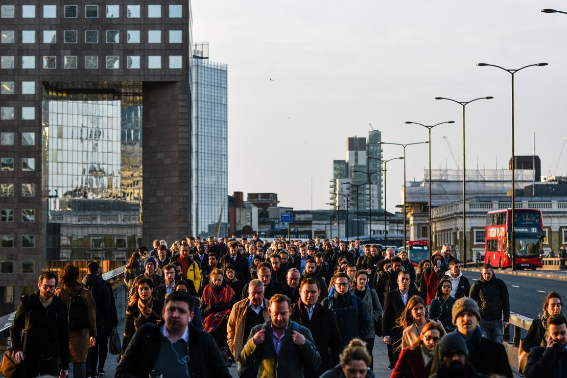 Commuters walk across London Bridge on February 3, 2020. The city went into lockdown on March 24.