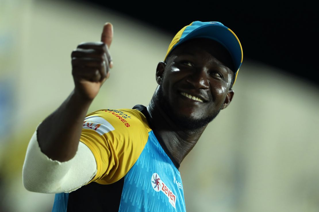 Sammy gives a thumbs up to the crowd while he plays for the St Lucia Stars.