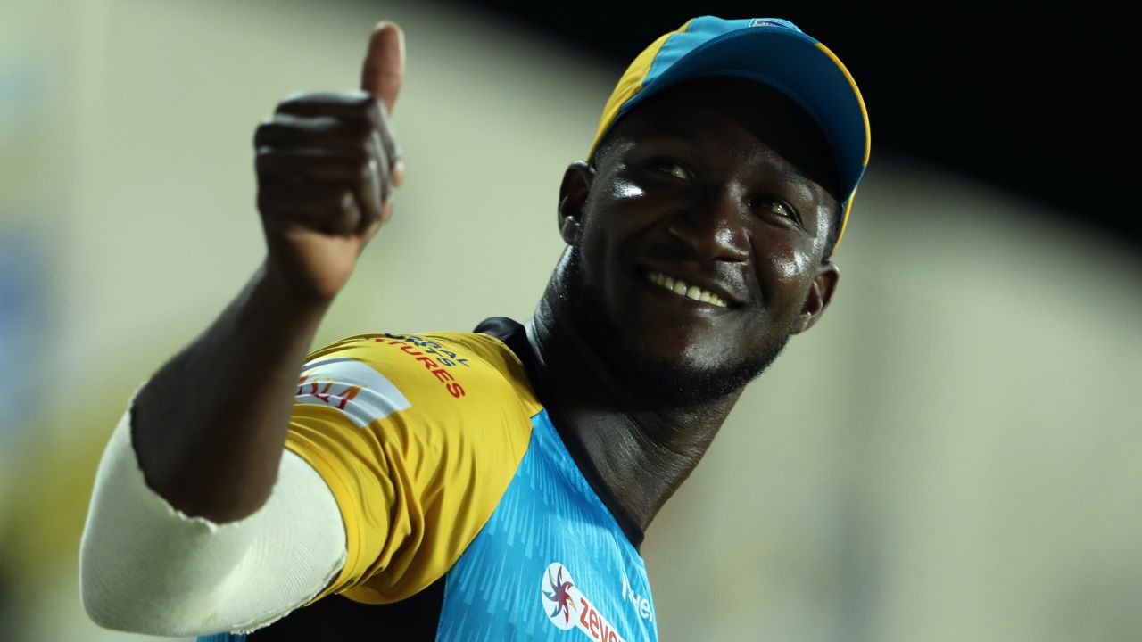 Sammy gives a thumbs up to the crowd while he plays for the St Lucia Stars.