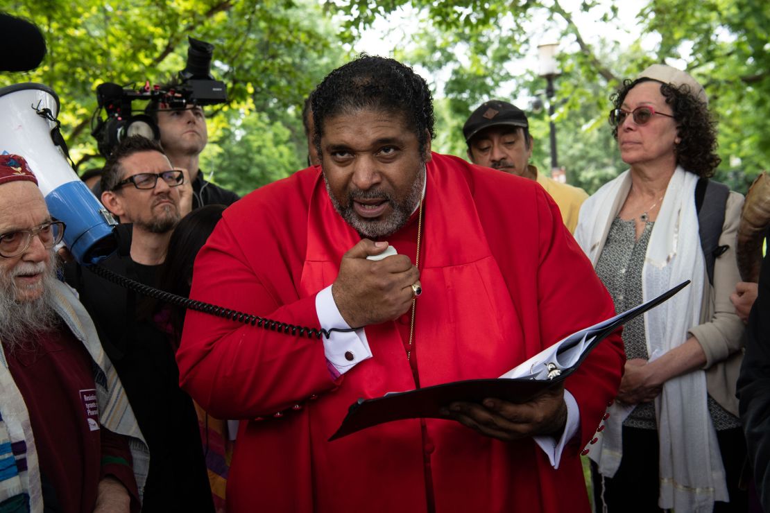 The Rev. William Barber, president of Repairers of the Breach, speaks in Washington on June 12, 2019. 