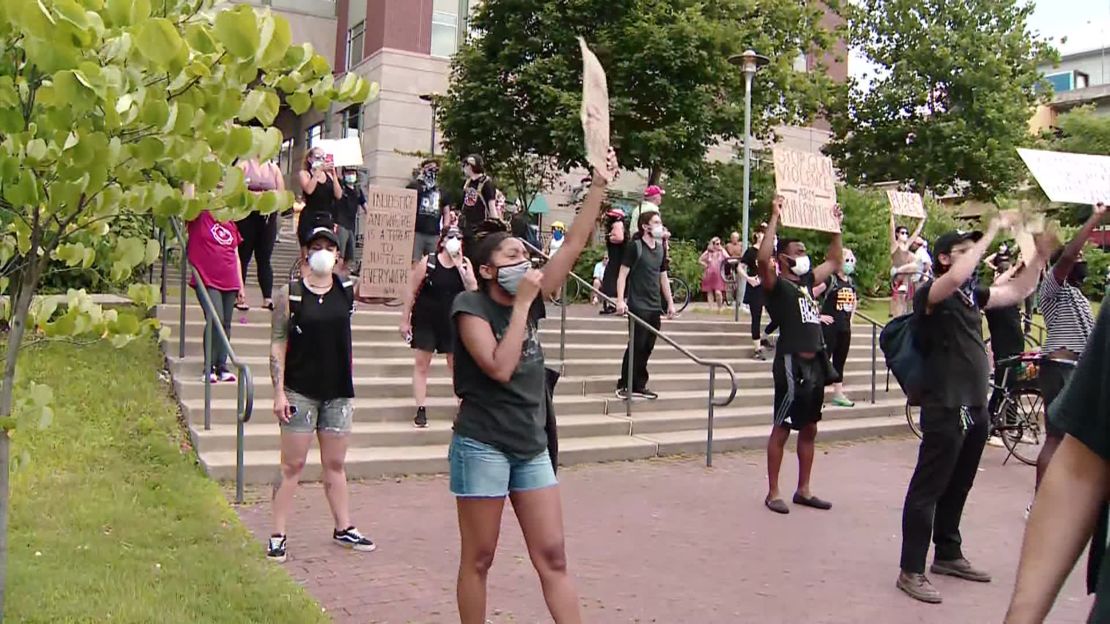 Protesters along Riverwalk in Pittsburgh on Saturday.