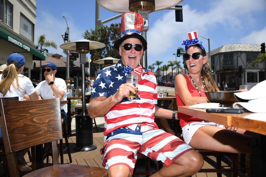 Dave Barnes and his wife Christy Barnes enjoy lunch at a restaurant in Manhattan Beach, California.