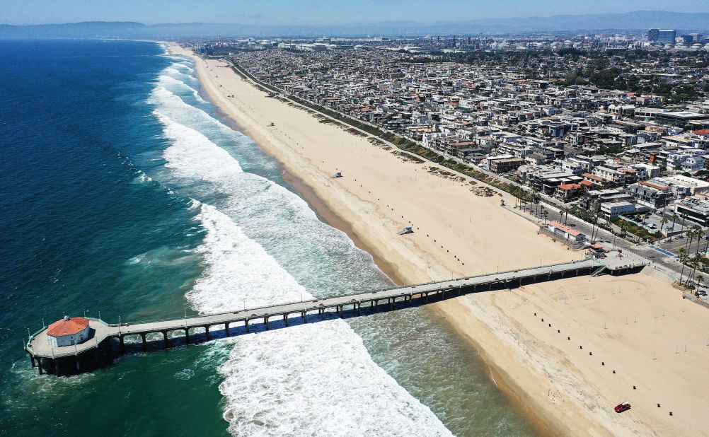 An aerial view of an empty beach in Manhattan Beach, California. Los Angeles County beaches were closed for the holiday in an effort to curb the spread of coronavirus.