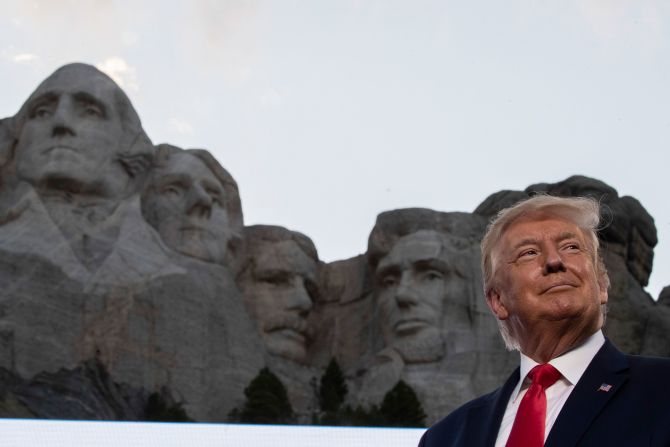 President Donald Trump smiles during an early Independence Day celebration at Mount Rushmore. During the event, President Trump made a <a href="index.php?page=&url=https%3A%2F%2Fwww.cnn.com%2F2020%2F07%2F03%2Fpolitics%2Ftrump-mount-rushmore-fireworks%2Findex.html" target="_blank">divisive speech</a> railing against the recent <a href="index.php?page=&url=https%3A%2F%2Fwww.cnn.com%2F2020%2F06%2F09%2Fus%2Fconfederate-statues-removed-george-floyd-trnd%2Findex.html" target="_blank">removal of monuments</a> around the country.