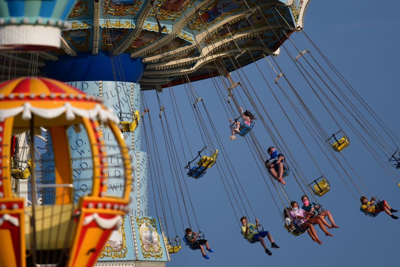 People enjoy an amusement park ride on a pier in Wildwood, New Jersey.