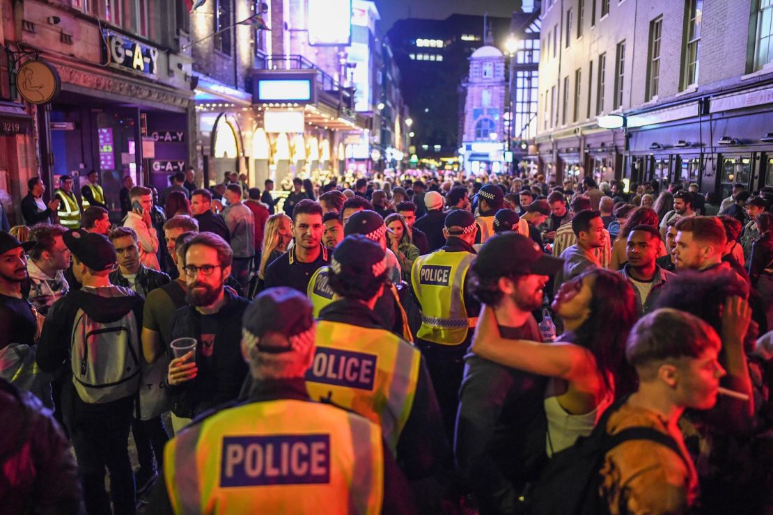 Officials have justified crackdowns on social drinking as a way to enforce social distancing. The results, as shown here in central London in July, have been mixed.