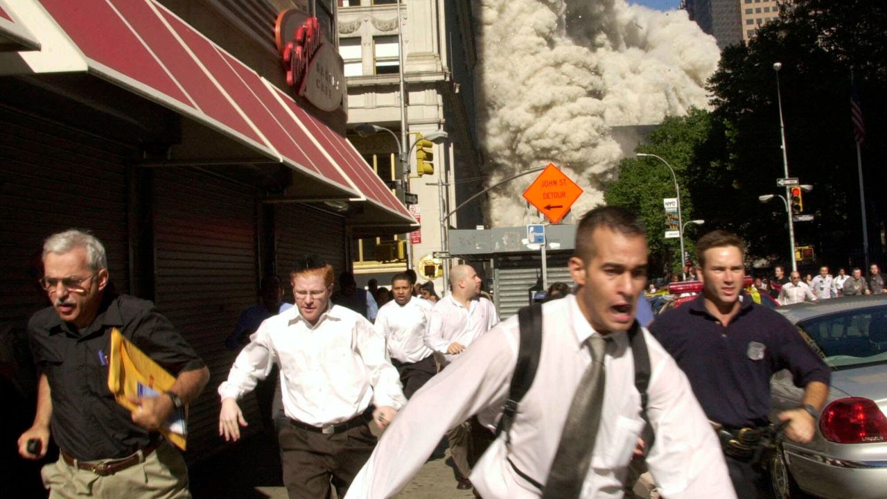 Stephen Cooper is pictured far left, wearing a black shirt, in this 9/11 photo.