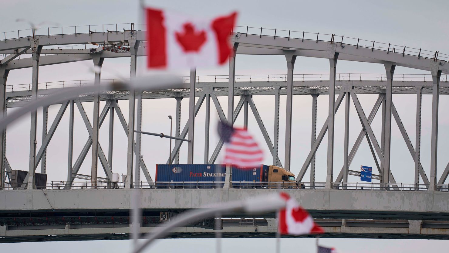 A truck crosses the Bluewater Bridge border crossing between Sarnia, Ontario and Port Huron, Michigan on March 16, 2020. - The Canadian government decided March 16, 2020 to close its borders to most foreign nationals with the exception of Americans. (Photo by Geoff Robins / AFP) (Photo by GEOFF ROBINS/AFP via Getty Images)