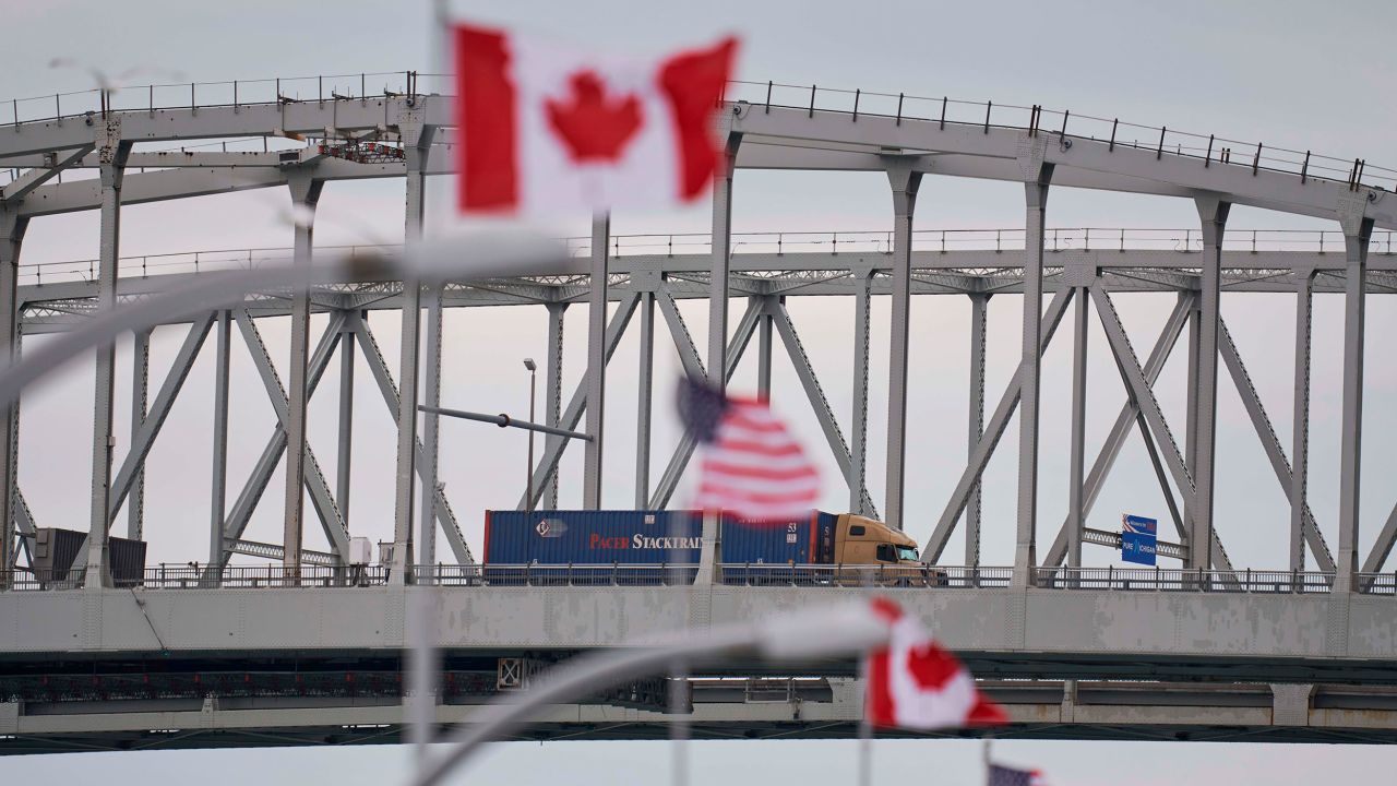 A truck crosses the Bluewater Bridge border crossing between Sarnia, Ontario and Port Huron, Michigan on March 16, 2020. - The Canadian government decided March 16, 2020 to close its borders to most foreign nationals with the exception of Americans. (Photo by Geoff Robins / AFP) (Photo by GEOFF ROBINS/AFP via Getty Images)