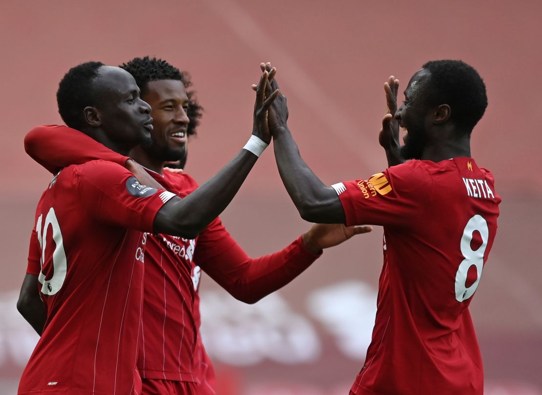 Liverpool celebrates Sadio Mane's opening goal against Aston Villa.