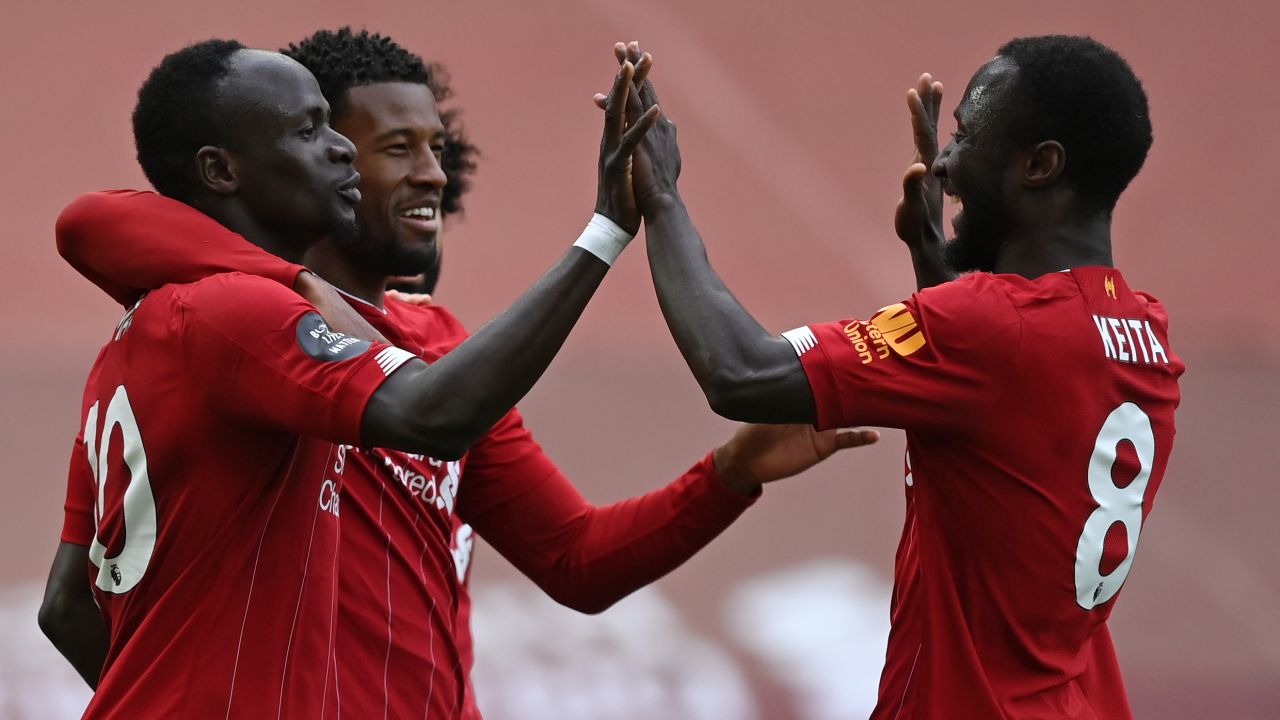 Liverpool celebrates Sadio Mane's opening goal against Aston Villa.