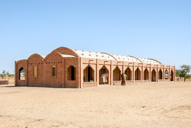 In a small village in the southern Sahara in Mali, Tanouan Ibi Primary School features some very unusual brickwork. Made from earth excavated on site, the bricks are un-fired and hydraulically compressed. According to Dutch architects <a href="index.php?page=&url=https%3A%2F%2Fwww.levs.nl%2Fprojecten%2F%23%21basisschool-tanouan-ibi" target="_blank" target="_blank">Levs Architecten</a>, the bricks are a blend of clay, sand, and laterite mixed with cement to make them water-resistant. 
