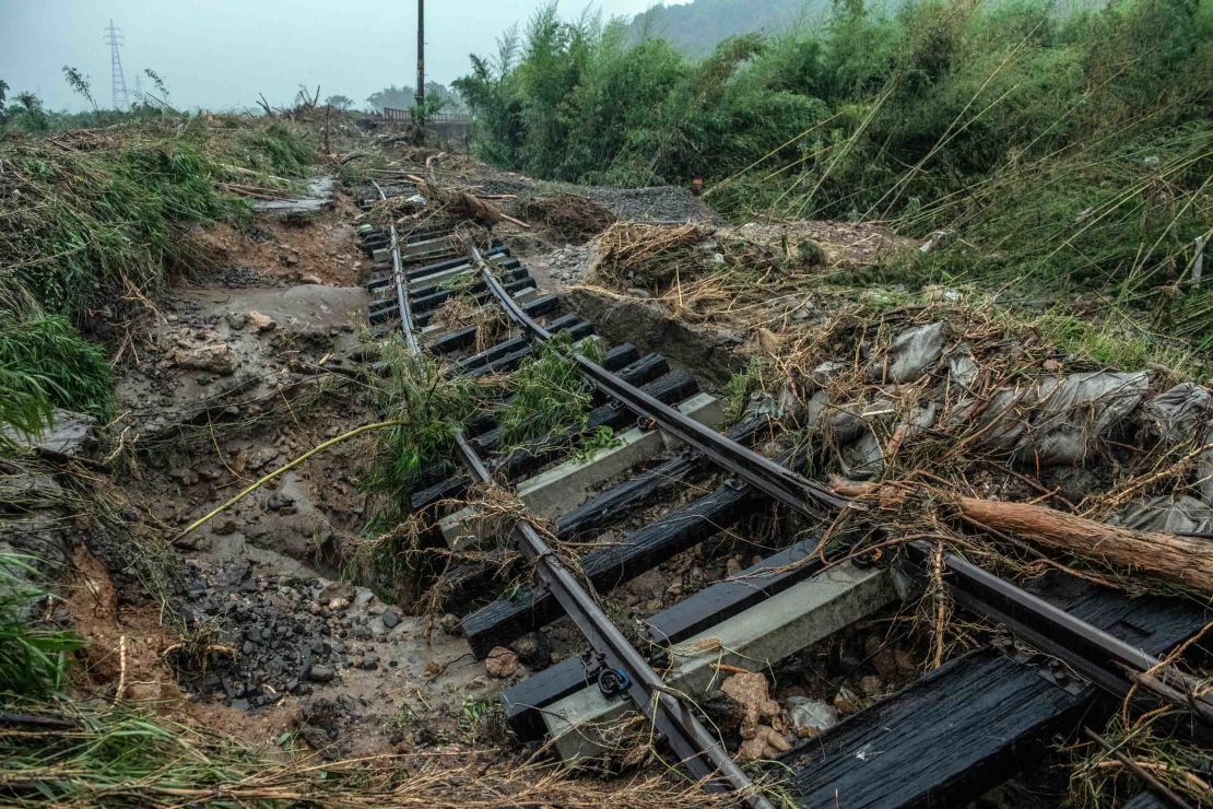 A rail line lies upturned after being submerged by floodwater when the nearby Kuma River burst its banks, on July 5 in Hitoyoshi, Japan.