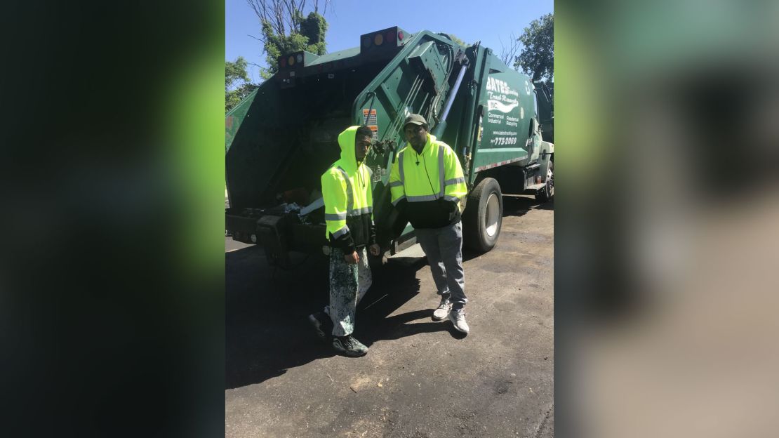 Rehan Staton, left, with his brother Reggie when they both worked at Bates Trucking Trash Removal Inc. 