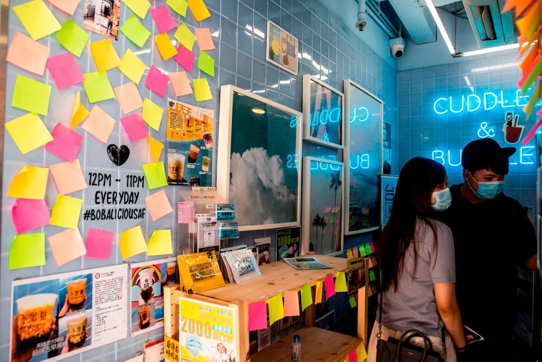 Blank notes are seen on a Lennon Wall inside a pro-democracy bubble tea shop in Hong Kong on July 3, 2020.