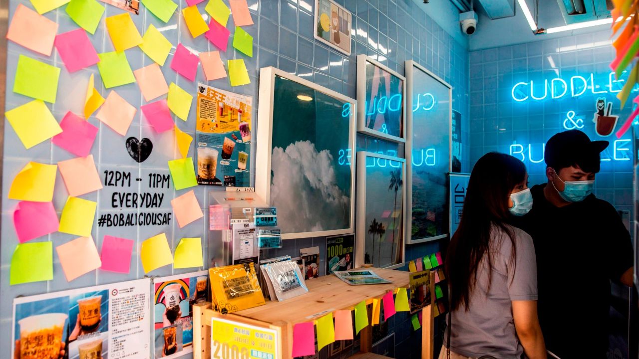 Blank notes are seen on a Lennon Wall inside a pro-democracy bubble tea shop in Hong Kong on July 3, 2020.